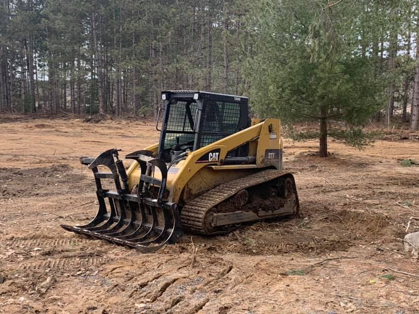 CAT skid steer on site